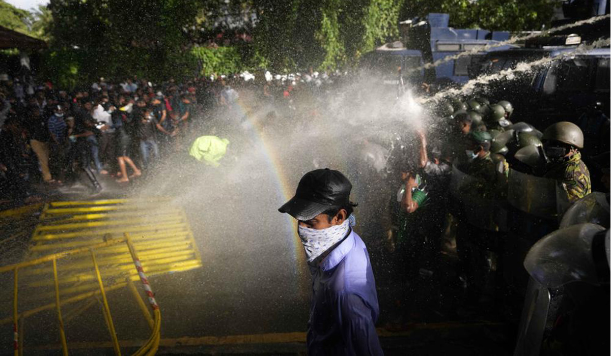 Police fire tear gas and water cannons